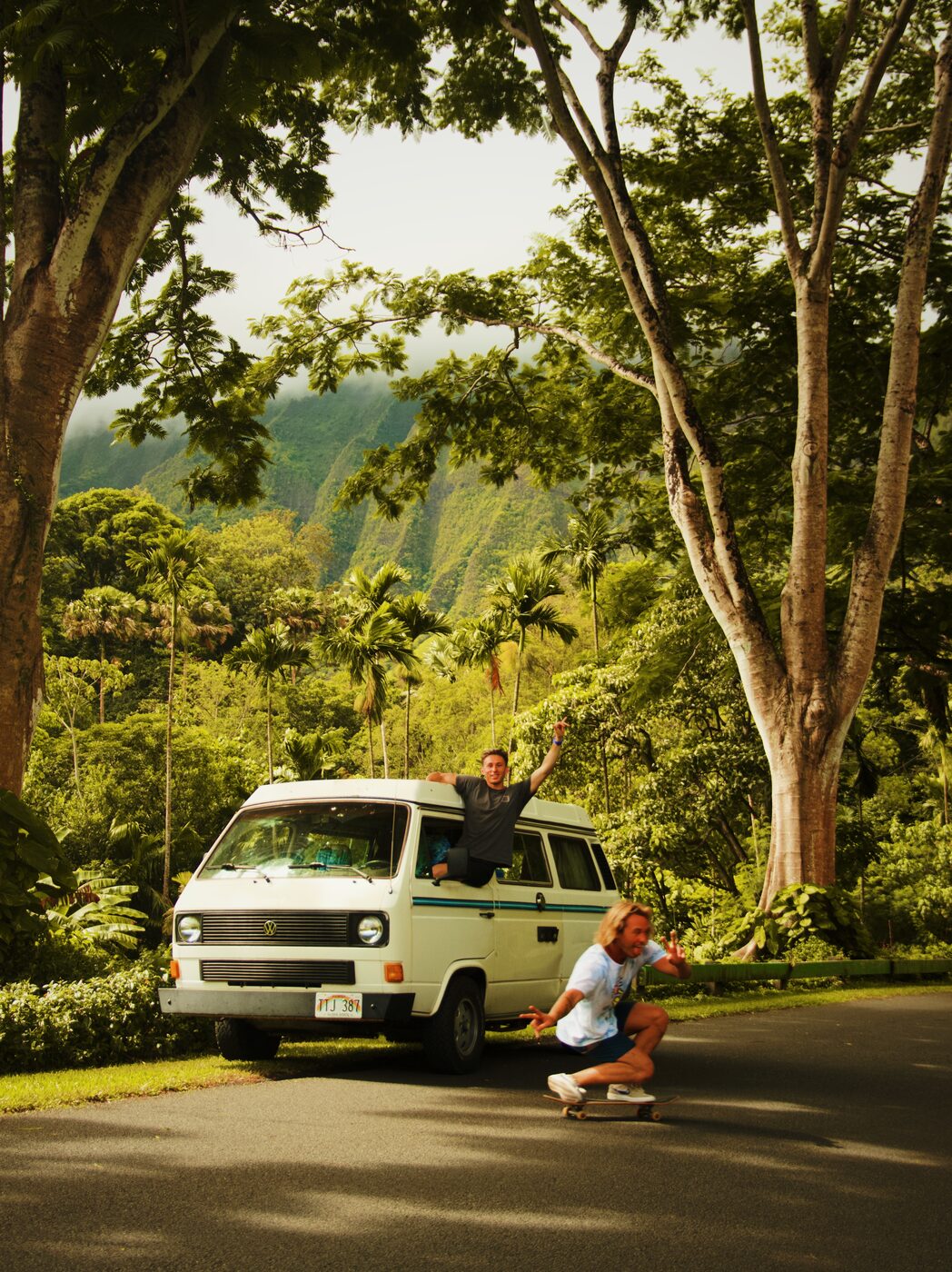 Jaro riding on top of a VW van in Hawaii